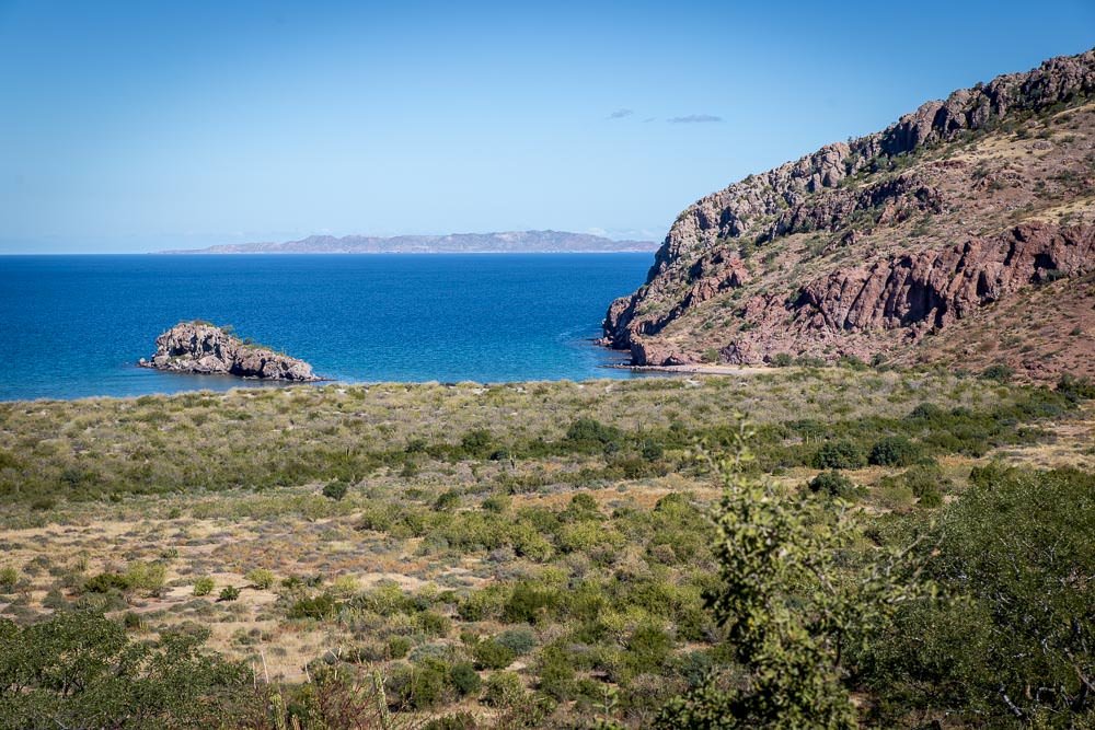 Here's the view down towards the beach as we drove away a few days later. Bonus points if you can spot the road. Here's the view down towards the beach as we drove away a few days later. Bonus points if you can spot the road.
