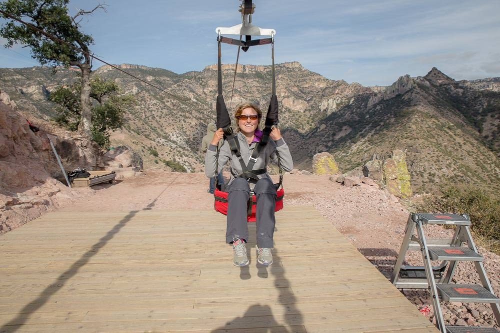 Emma, looking pretty stoked after zipping her way along 2.5km of narrow cable. Emma, looking pretty stoked after zipping her way along 2.5km of narrow cable.