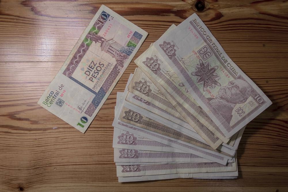 CUC (Cuban Convertible Pesos)—the tourist pesos on the left and MN (Moneda Nacional) (or CUP) —the local currency on the right.