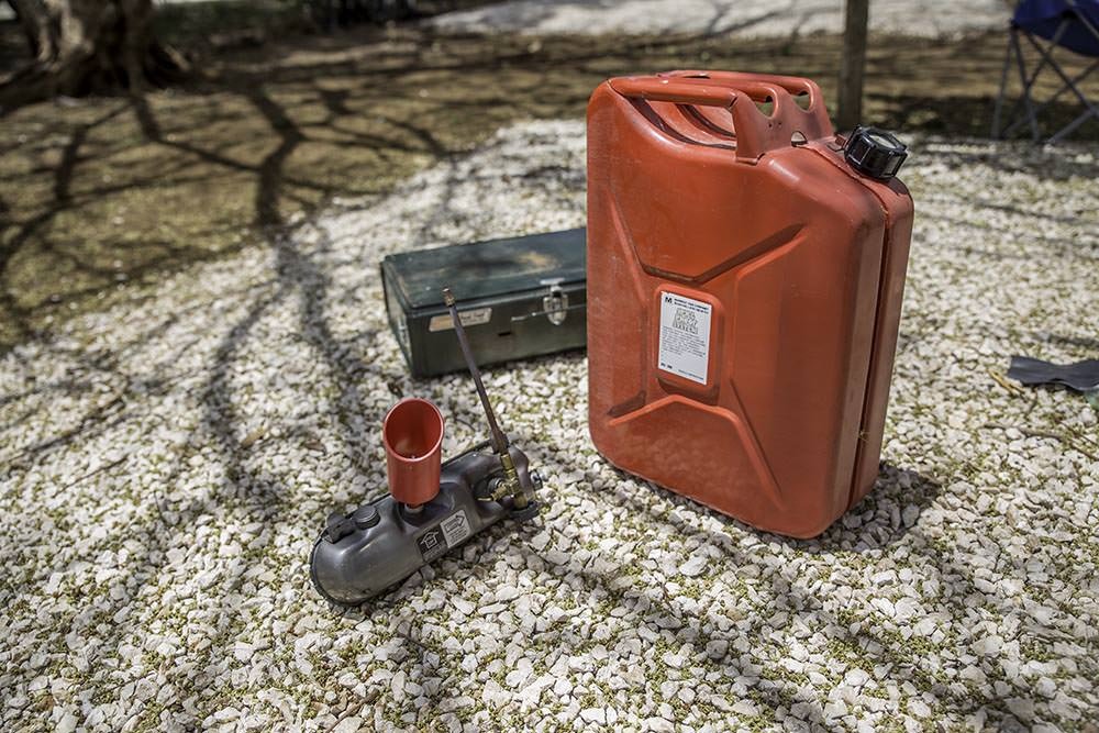 We recommend filling from something a little easier to manoeuvre than this large jerry can. But it does the trick.